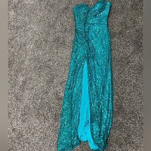 Floor length formal/promdress. Size small. Worn once. Has a slit